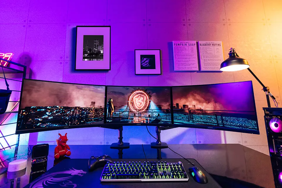 triple curved monitor gaming setup